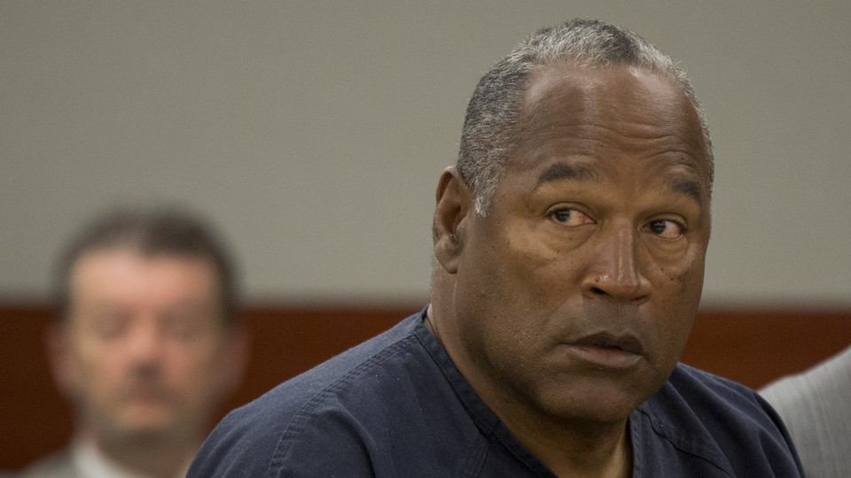 O.J. Simpson listens during an evidentiary hearing in Clark County District Court in Las Vegas, Nevada, on May 16, 2013.