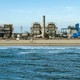 A desalination plant along the beach, in California