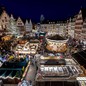 An elevated view of a brightly lit Christmas marketplace