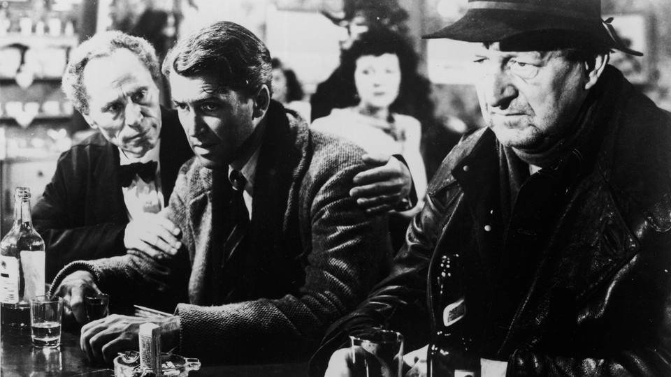 Jimmy Stewart as George Bailey, depressed at a bar, in "It's a Wonderful Life"