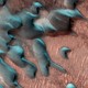 An orbiting spacecraft's view of frost, made of carbon dioxide and water, on the surface of Mars