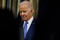 Picture of Joe Biden over a blurred background.