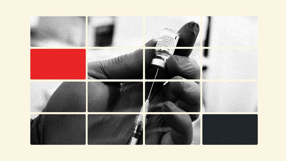 Black-and-white photo of gloved hand holding a syringe