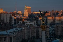 A sunset scene of Kyiv in golden light