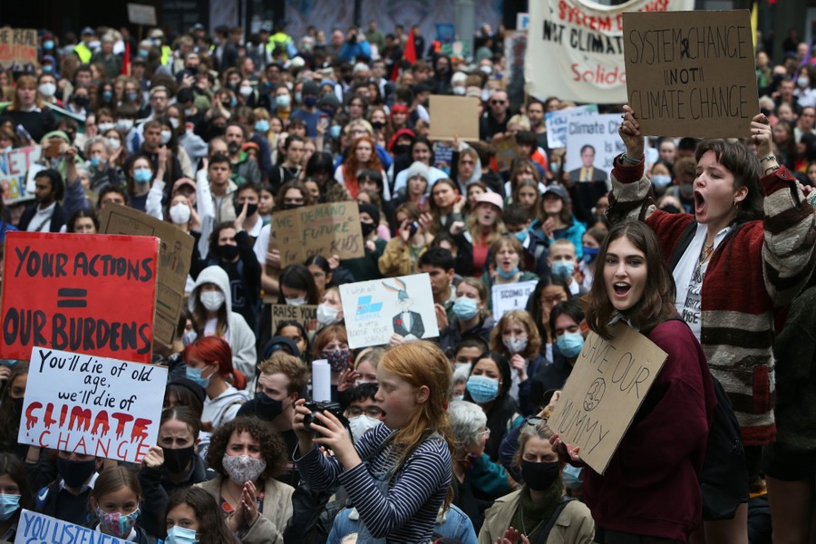 Hundreds of climate activists gather to protest.