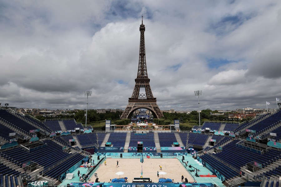 A view of a beach-volleyball arena in front of the Eiffel Tower