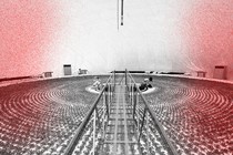 Farmers work in a dome-shaped hydroponic lettuce factory.