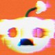 A blurry, distorted, pixellated image of the Reddit robot's head against an orange background