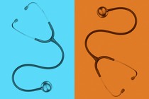 Two stethoscopes side by side, shaded in blue and orange