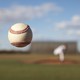 A pitcher throws a baseball