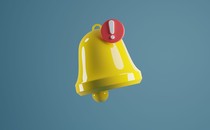 A yellow bell with a exclamation point notification sign