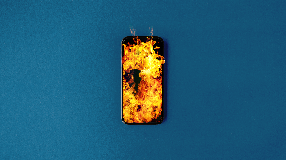 Photo-illustration of a burning phone