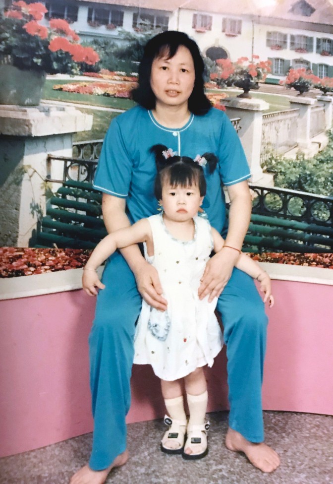 Misty Ouyang at age 4, with her grandmother, whom she was living with in China at the time