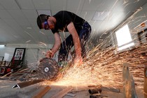 A man working with metal