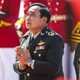 Prayuth Chan-ocha, the head of Thailand's military junta, prays at a military parade in 2014.