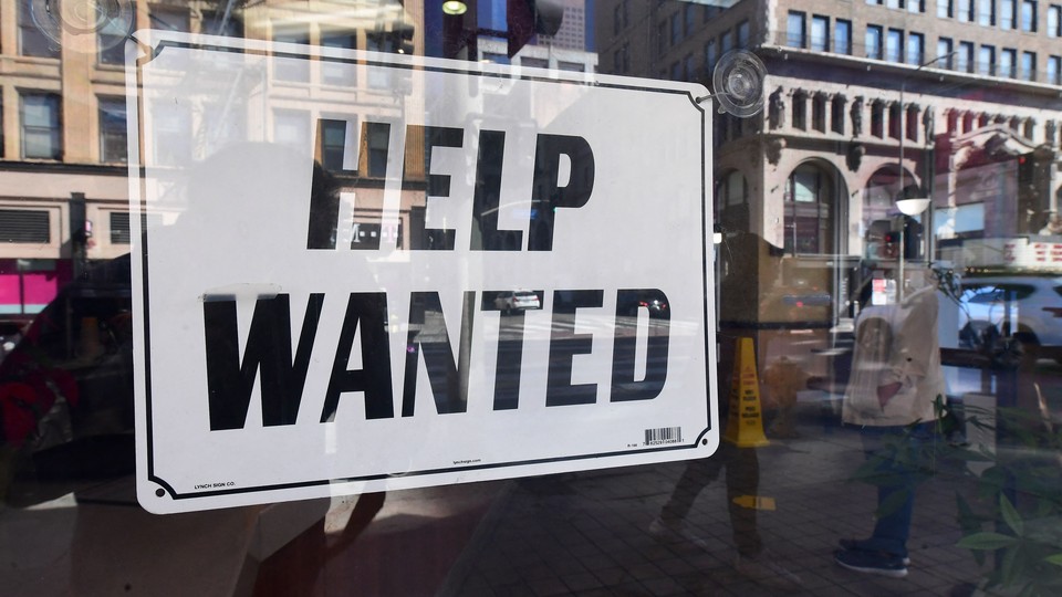 A "Help Wanted" sign
