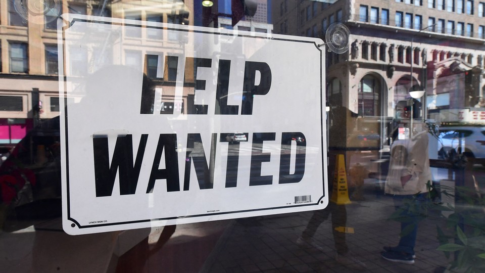 A "Help Wanted" sign