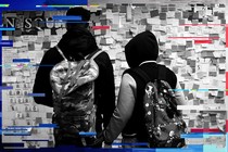 People look at post-election Post-it notes at the Union Square subway station in New York, in November 2016. 