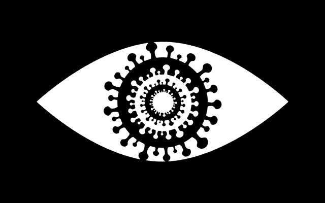 An eye with a coroanvirus as the pupil