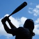 Jacqueline Reynolds swings during tryouts for the Women’s Professional Baseball League.
