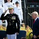 Joseph Dunford salutes as Donald Trump walks past.