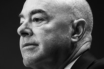 A black-and-white photo of Alejandro Mayorkas