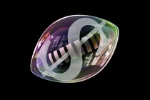A dollar sign inside a transparent football