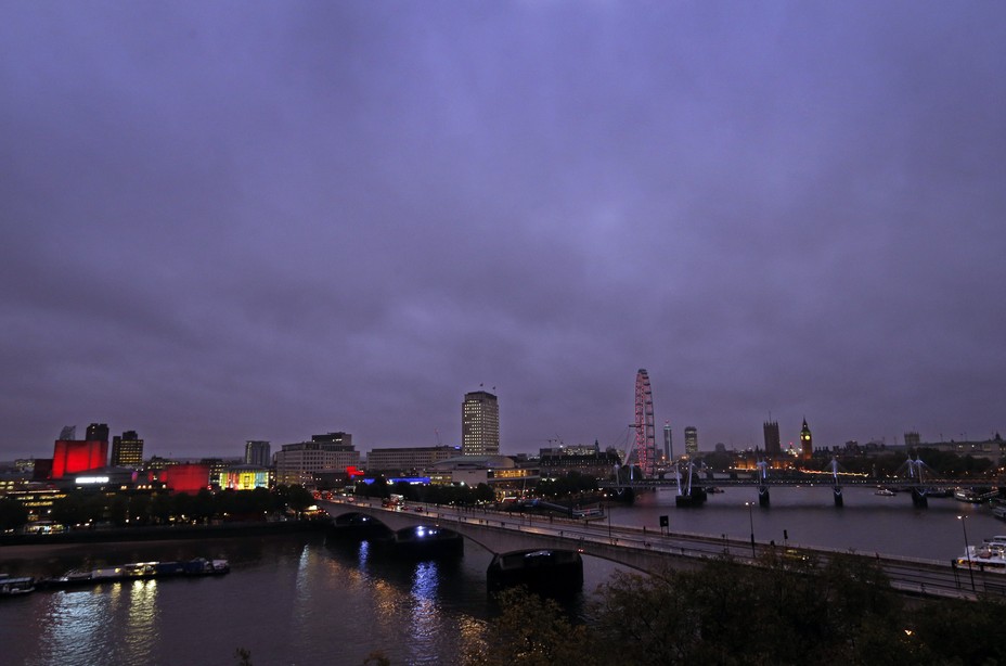 A view of the London skyline, with the National Theatre, Waterloo Bridge and the London Eye.