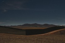 Border Wall at night