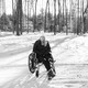 Photo of Caitlin Barber in wheelchair in snow