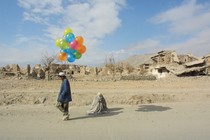 Boy selling balloons in Kabul in the early 1990's.