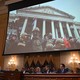 An image of rioters is projected during the final congressional hearing on the January 6th attack, on December 19, 2022.
