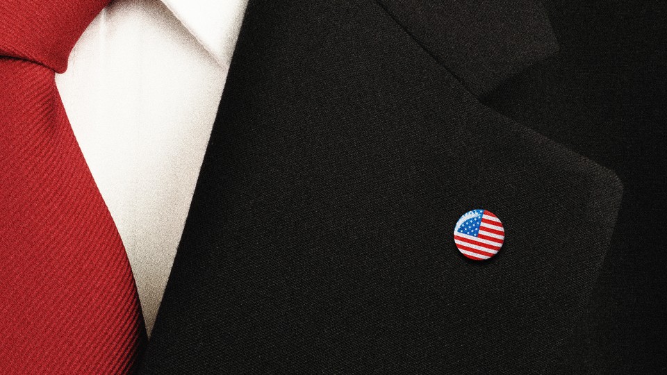 a flag pin on a suit lapel