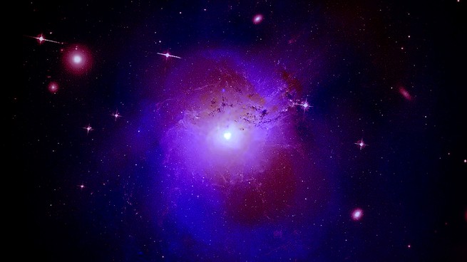 A composite image of the Perseus galaxy cluster, rendered here in bright purple, located 250 million light-years from Earth