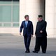 Kim Jong Un and Moon Jae In walking