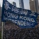 Protesters march to the U.S. consulate in Hong Kong, September 8​, 2019. Protesters carrying Am​erican flags sought support fo​r a bill in Congress that woul​d punish Chinese officials who​ suppress freedoms in the city​.