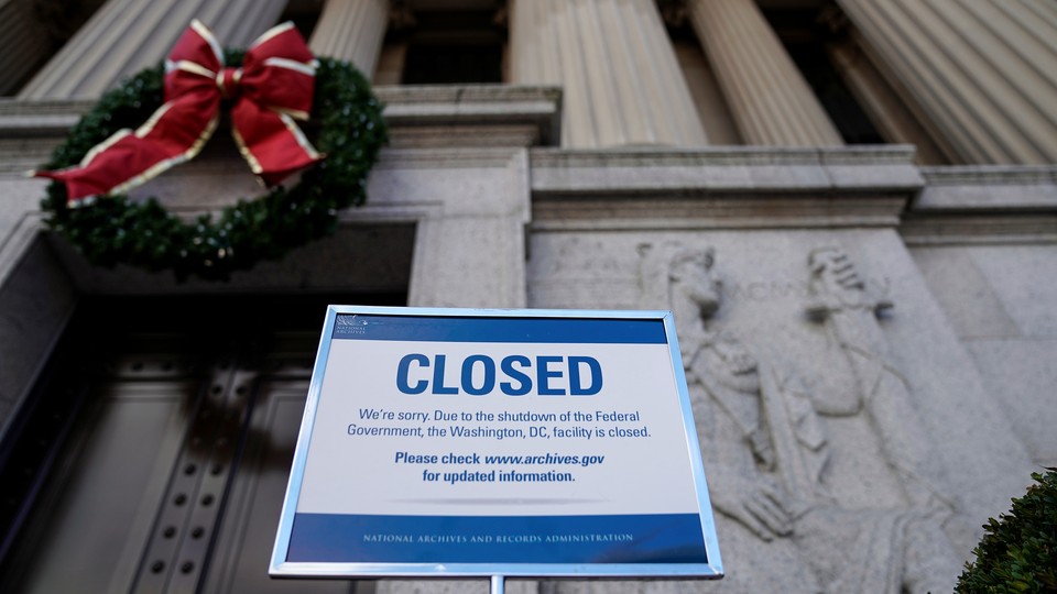 A sign declares the National Archive is closed because of a partial federal-government shutdown in Washington.