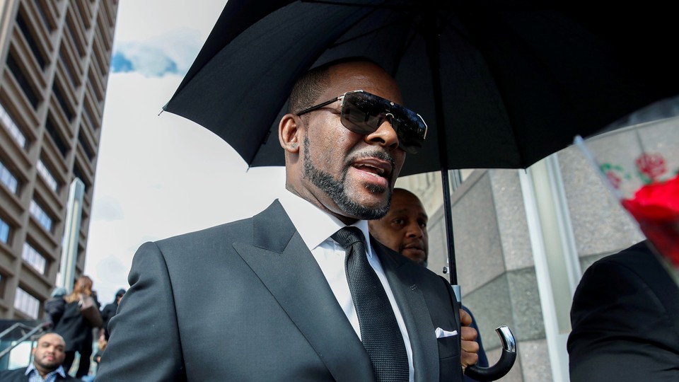 R. Kelly leaves the Cook County courthouse in Chicago.
