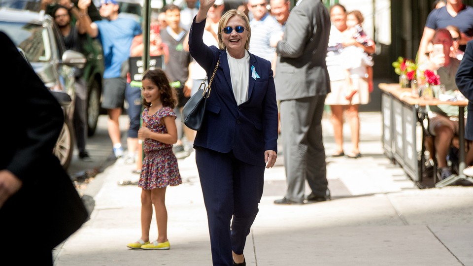 Hillary Clinton leaving her daughter's apartment building on September 11 in New York