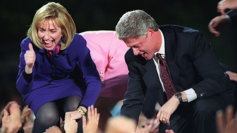 Bill and Hillary Clinton greet supporters at a victory rally in 1992.