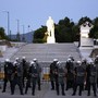 Riot police stand guard outside the Greek Parliament in 2015.