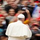 Pope Francis in front of a crowd