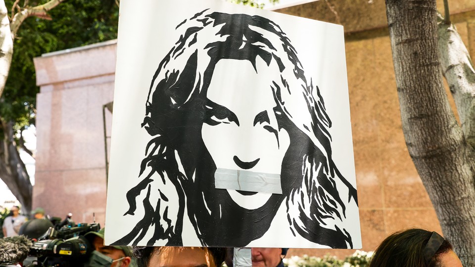 Activists protest during a conservatorship hearing for Britney Spears.