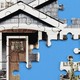 a puzzle of a house has some missing pieces