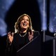 Kamala Harris smiling during a speech