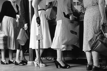 A group of people waiting in line