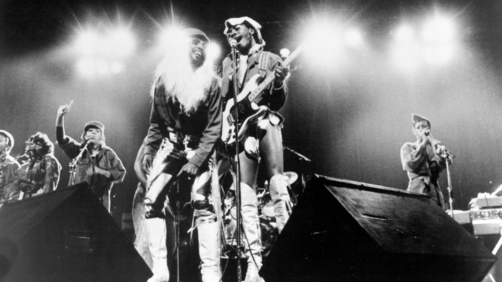 George Clinton and Garry Shider of the funk band Parliament-Funkadelic perform onstage circa 1977.