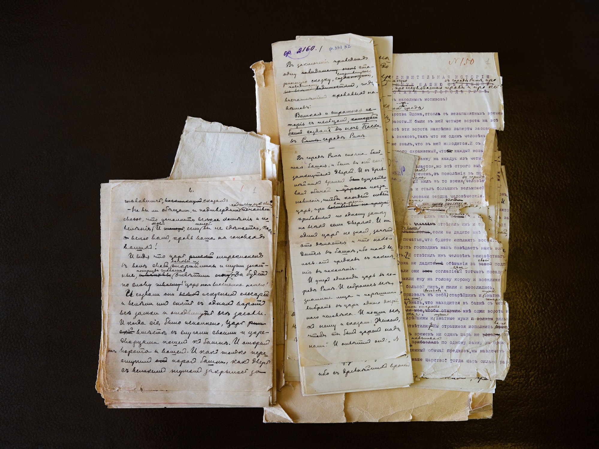 photo of stacks of manuscript strips and fragments