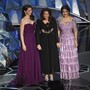 Ashley Judd, Annabella Sciorra, and Salma Hayek onstage at the 90th Academy Awards ceremony