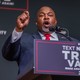 Mark Robinson speaks in front of a Trump-Vance podium